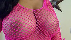 Southern Brooke and her busty body in a pink fishnet bodystocking.
