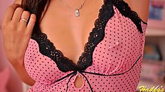 Hailey in some thin sheer pink dot lingerie poking pierced nipples.
